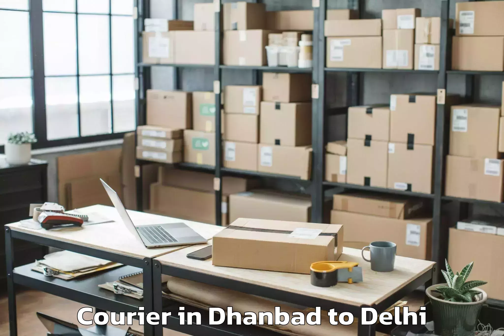 Reliable Dhanbad to Unity One Janakpuri Mall Courier